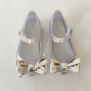 - NWOT Mini Melissa silver flats